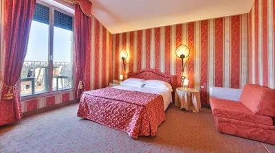 Letto o letti in una camera di Hotel Biasutti