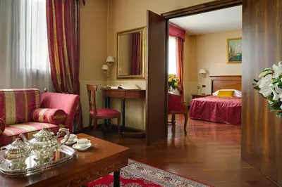 Letto o letti in una camera di Villa Pace Park Hotel Bolognese
