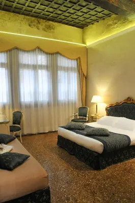 Letto o letti in una camera di Ca' Amadi