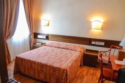 Letto o letti in una camera di Hotel Le Boulevard