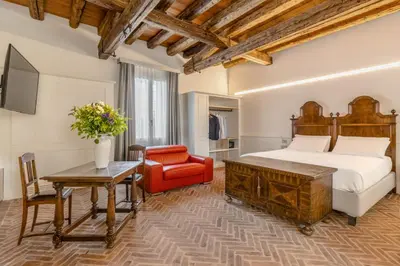 Letto o letti in una camera di Relais Barchessa Molon