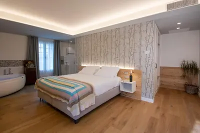 Letto o letti in una camera di Relais Barchessa Molon