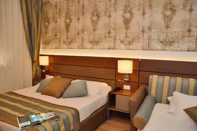 Letto o letti in una camera di LH Hotel Sirio Venice