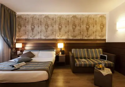 Letto o letti in una camera di LH Hotel Sirio Venice