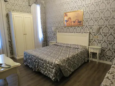 Letto o letti in una camera di Hotel Bridge