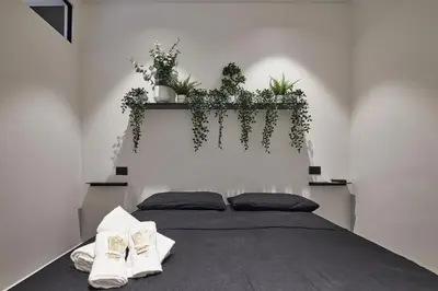 Letto o letti in una camera di AFTER8-BLACK&WHITE