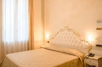 Letto o letti in una camera di Hotel Villa Stucky