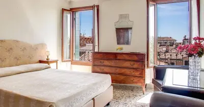Letto o letti in una camera di Pensione Seguso