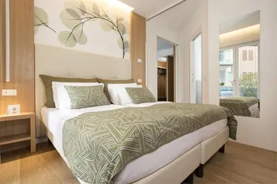 Letto o letti in una camera di Hotel Cavalieri Palace & Suites