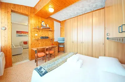Letto o letti in una camera di DolceVita Apartments N 496