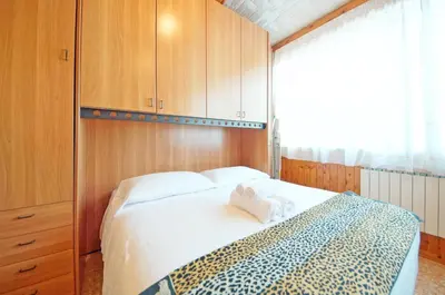 Letto o letti in una camera di DolceVita Apartments N 496