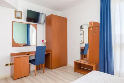 Letto o letti in una camera di Hotel Palladio