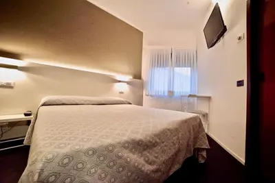 Letto o letti in una camera di Hotel Centrale