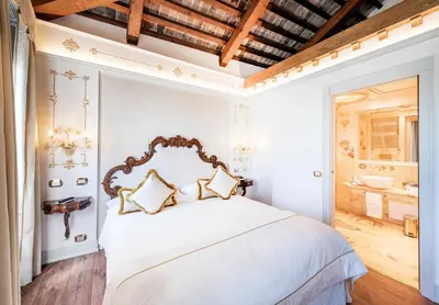 Letto o letti in una camera di Monaco & Grand Canal