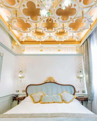 Letto o letti in una camera di Monaco & Grand Canal