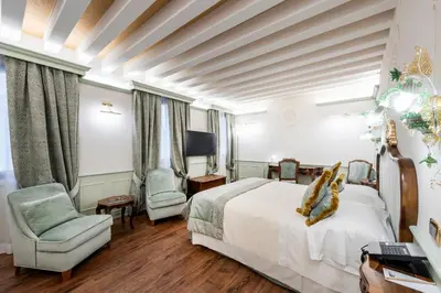 Letto o letti in una camera di Monaco & Grand Canal