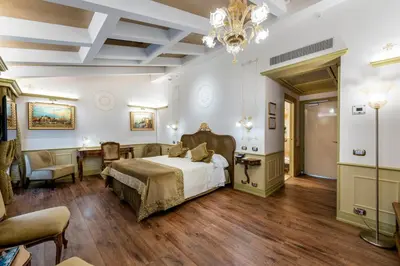 Letto o letti in una camera di Monaco & Grand Canal