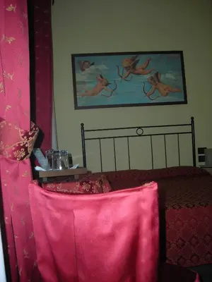 Letto o letti in una camera di Hotel Agli Artisti