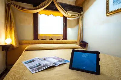 Letto o letti in una camera di Hotel Mercurio