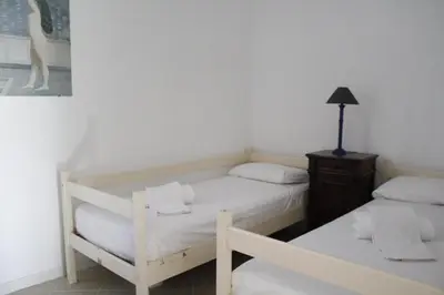 Letto o letti in una camera di Appartamento Redentore