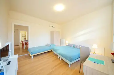 Letto o letti in una camera di Ca' Circus 4 Rooms WI-FI Fibre