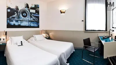 Letto o letti in una camera di Sure Hotel by Best Western Milano