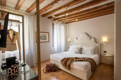 Letto o letti in una camera di Daplace - Antica Casa Coppo 1
