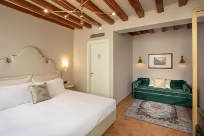 Letto o letti in una camera di Daplace - Antica Casa Coppo 1