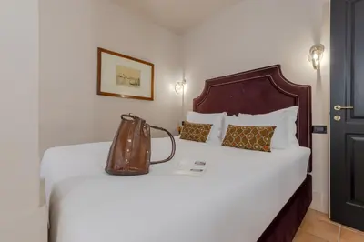 Letto o letti in una camera di Daplace - Antica Casa Coppo 1