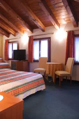 Letto o letti in una camera di Hotel Antico Moro