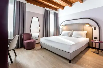 Letto o letti in una camera di BEST WESTERN Titian Inn Hotel Treviso