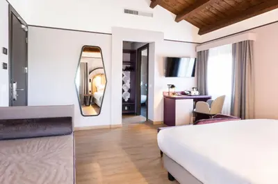 Letto o letti in una camera di BEST WESTERN Titian Inn Hotel Treviso
