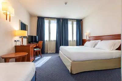 Letto o letti in una camera di BEST WESTERN Titian Inn Hotel Treviso