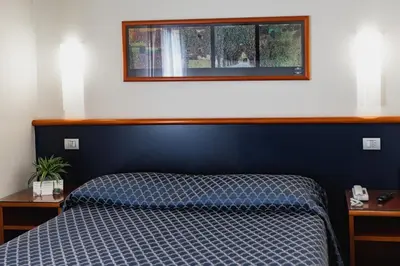Letto o letti in una camera di Hotel Crystal