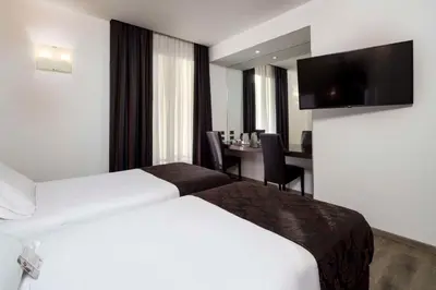 Letto o letti in una camera di Best Western Hotel Biri