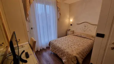 Letto o letti in una camera di Hotel Carlton Capri