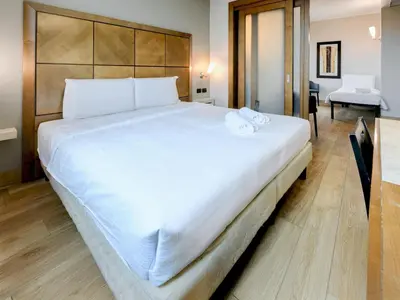 Letto o letti in una camera di B&B HOTEL Padova