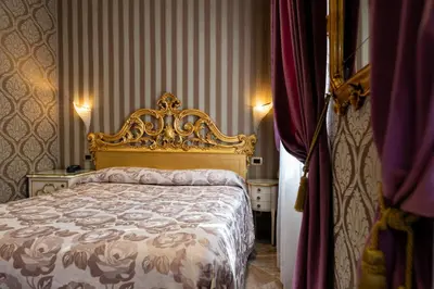 Letto o letti in una camera di Hotel Santa Marina