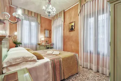 Letto o letti in una camera di Hotel Firenze
