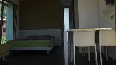 Letto o letti in una camera di INGRAPPA CUBE
