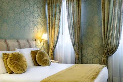 Letto o letti in una camera di A Tribute To Music Residenza