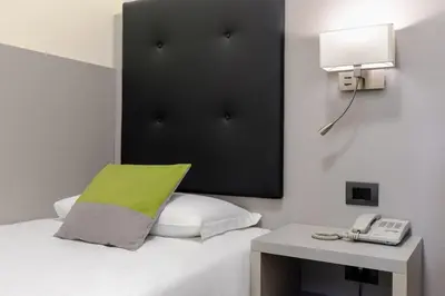 Letto o letti in una camera di Hotel Aurora