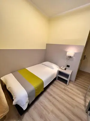 Letto o letti in una camera di Hotel Aurora