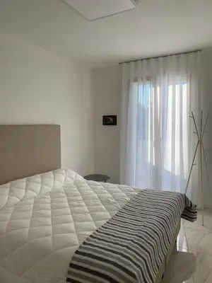 Letto o letti in una camera di Agua Apartment with beach included