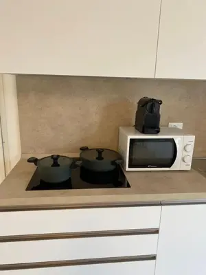 Cucina o angolo cottura di Agua Apartment with beach included