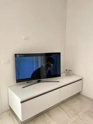 TV o dispositivi per l'intrattenimento presso Agua Apartment with beach included