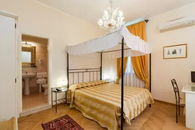 Letto o letti in una camera di Villa Casanova