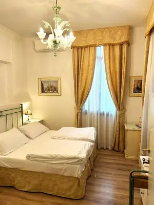 Letto o letti in una camera di Villa Casanova