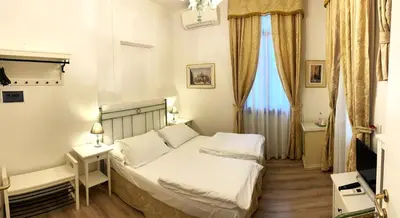 Letto o letti in una camera di Villa Casanova
