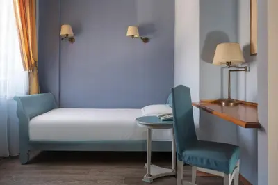 Letto o letti in una camera di Hotel Campo Marzio